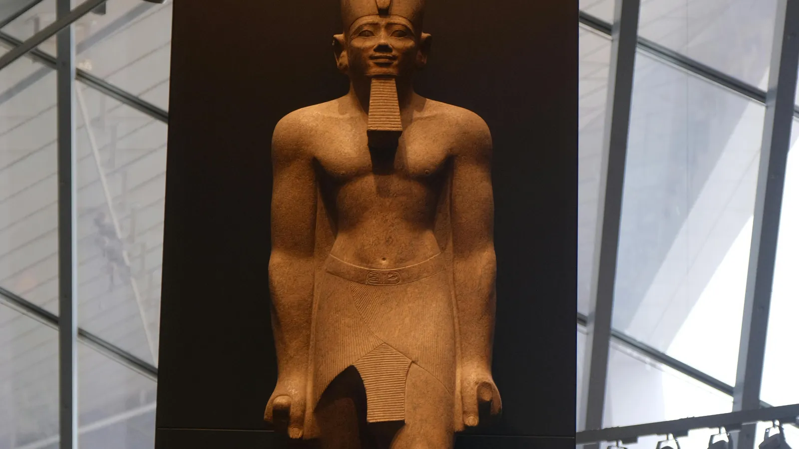 Colossal statue of Ramses II in the atrium of the Grand Egyptian Museum, Giza