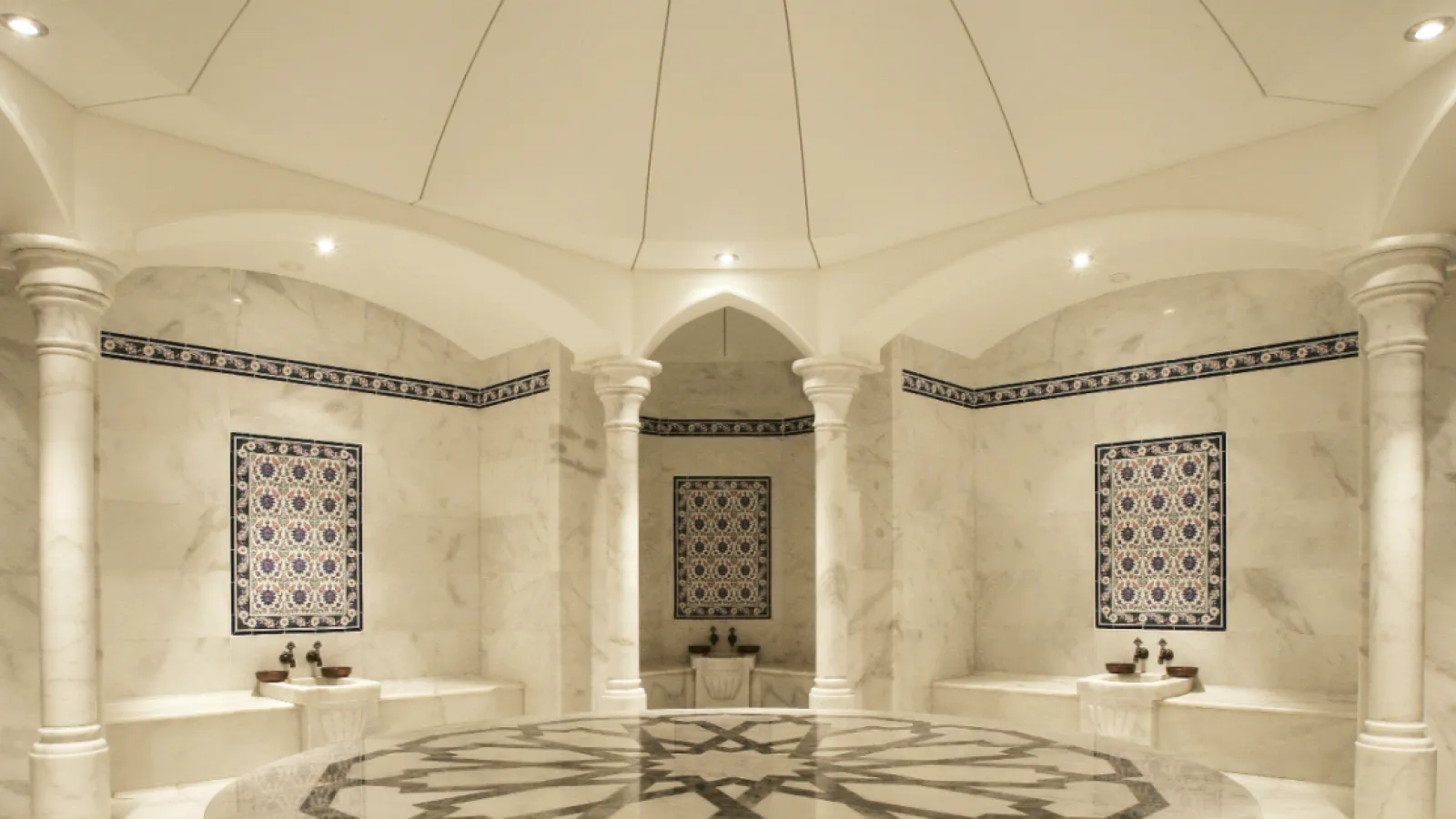 Marble hammam hall with a domed ceiling and ornamental tiles at the Hurghada spa