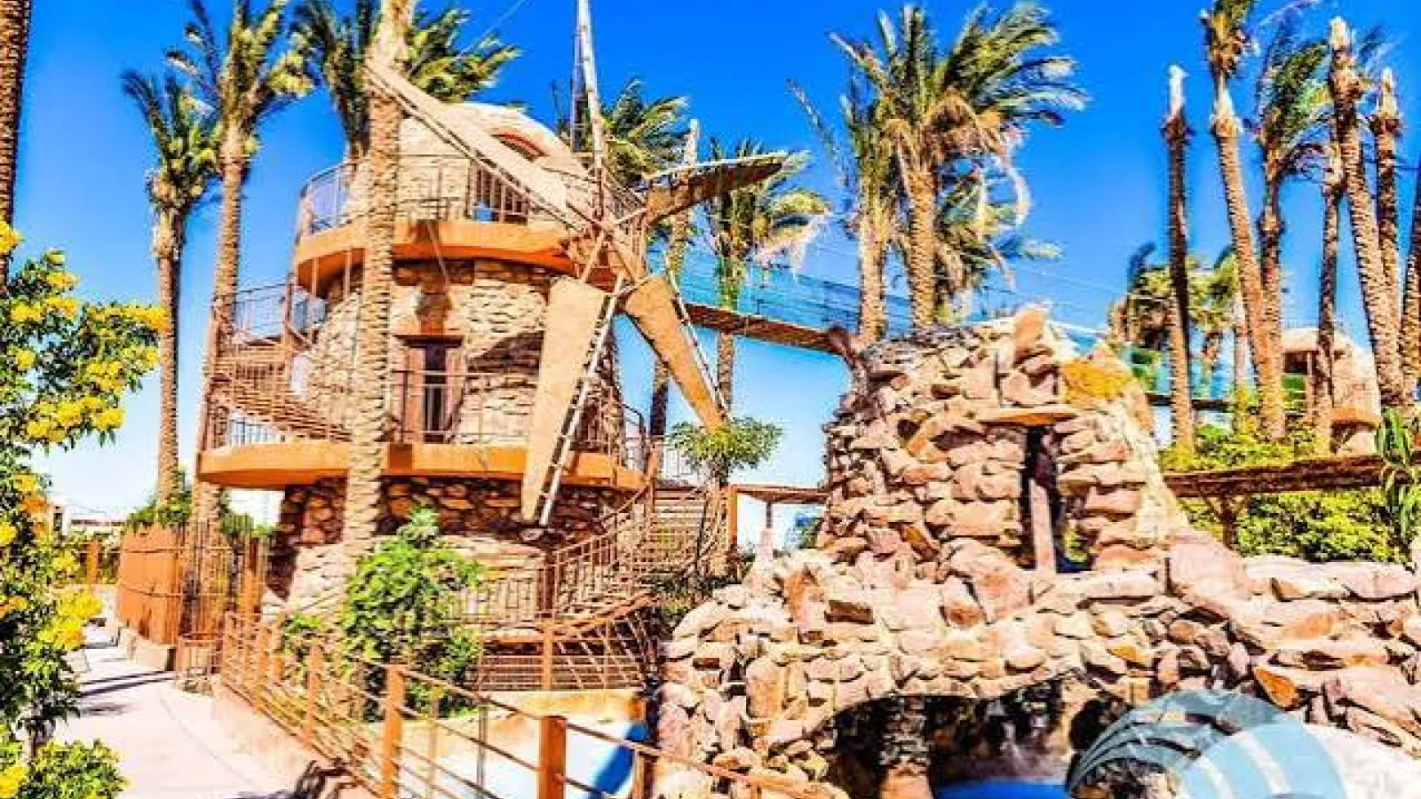 Windmill tower and rock grotto in the tropical gardens of the Grand Aquarium, Hurghada